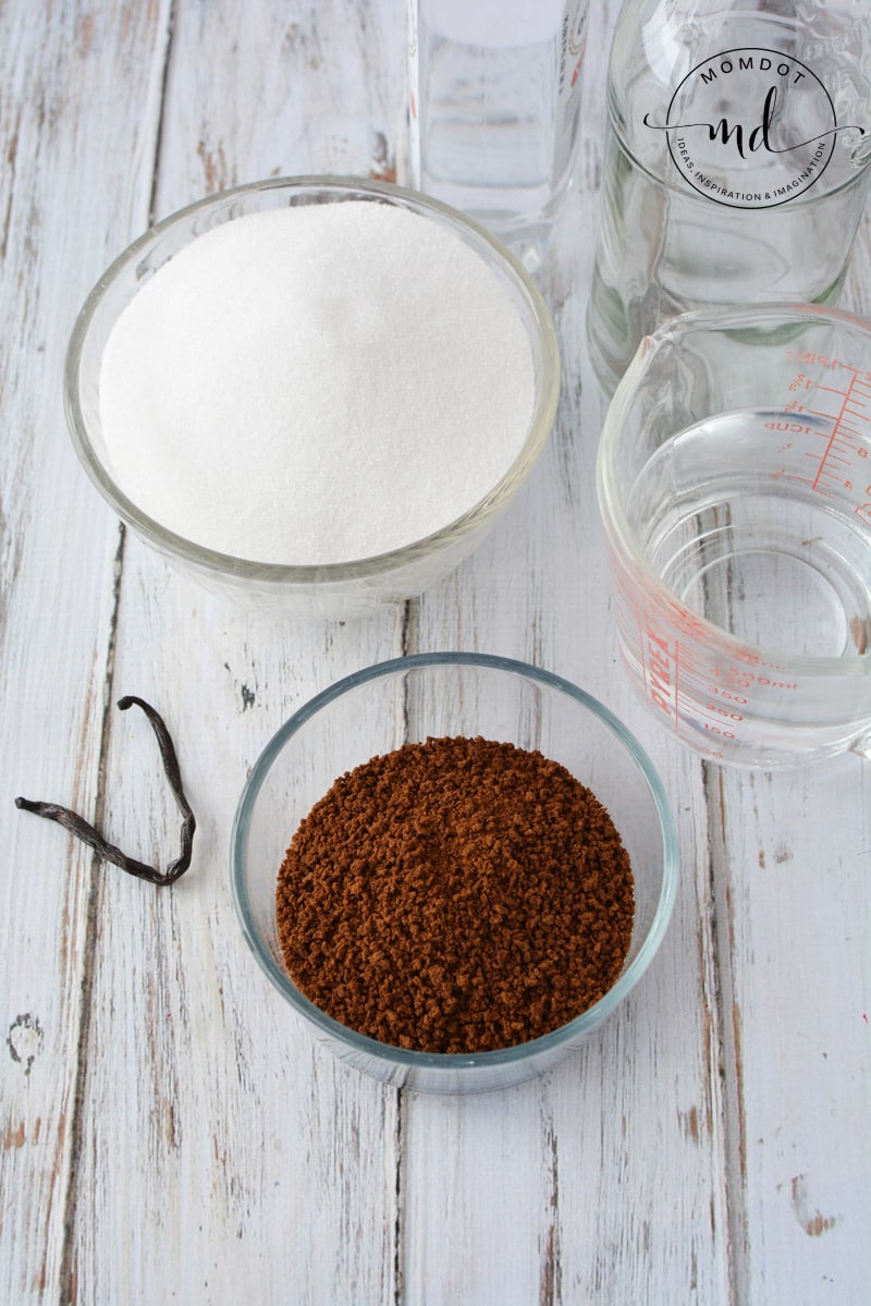 Sugar, vodka, vanilla bean, and instant coffee granules to make homemade Kahlua.