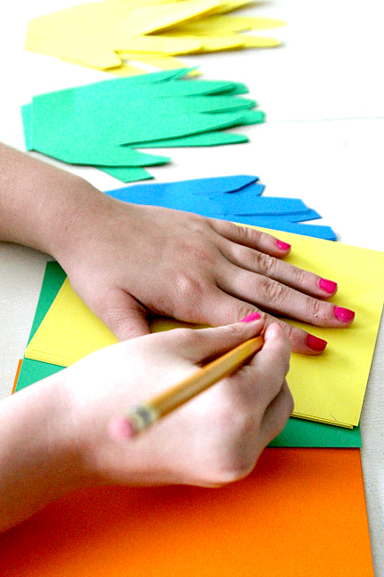 St Patricks Day Kids Activity: Handprint Rainbows more at www.momdot.com