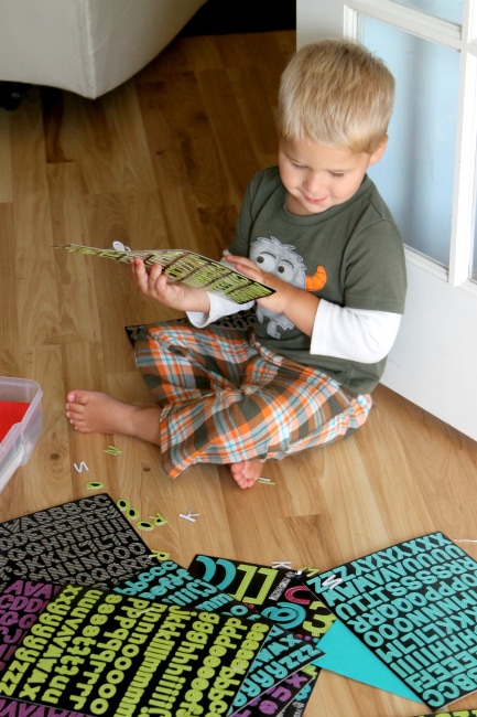 Have your toddler punch out scrapbook letters to practice dexterity , learn more at www.momdot.com