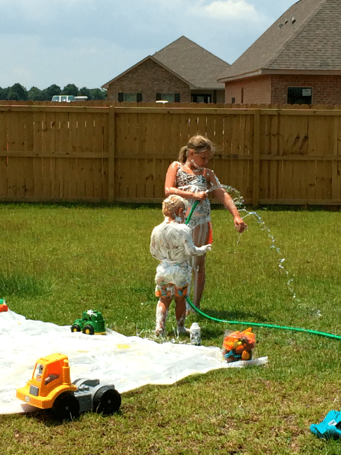 Ready to have some summer fun? Create an outdoor play area that cleans up easy..REALLY! 