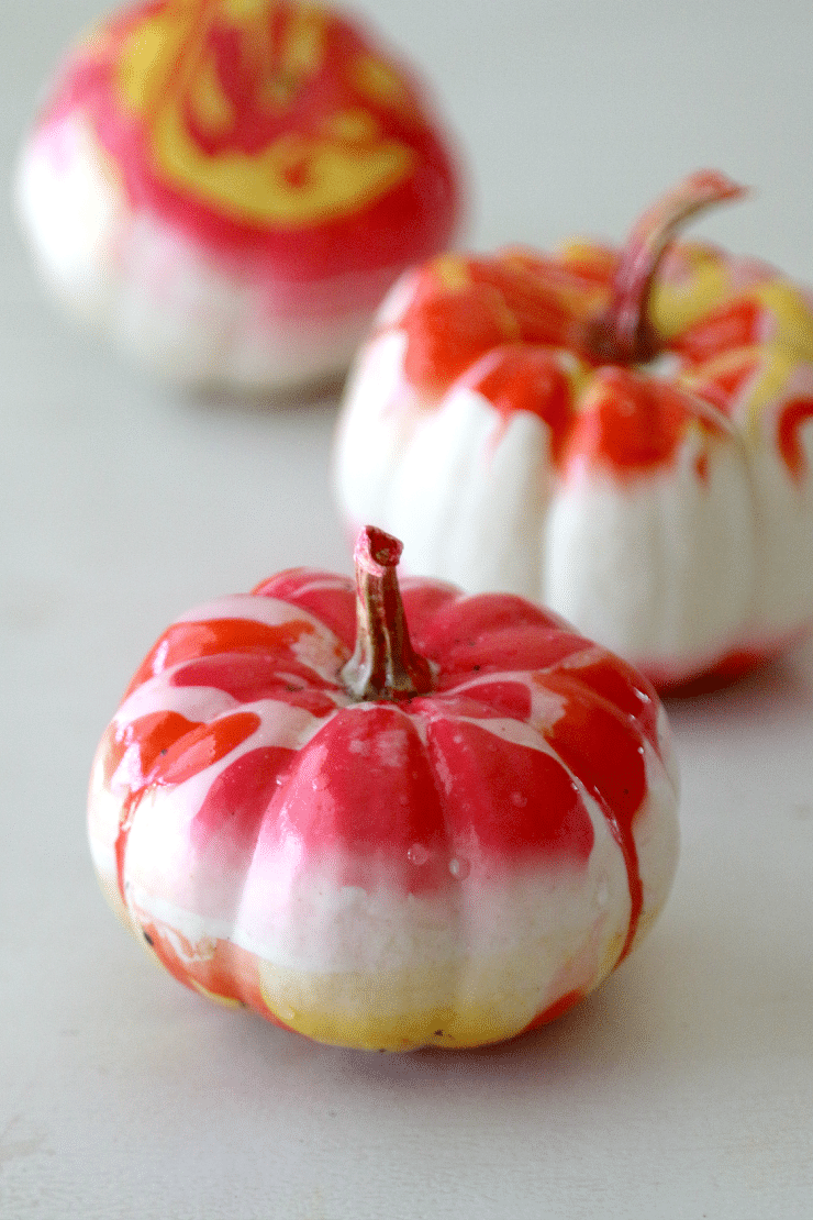 Marble dip pumpkins - a quick and easy fall craft for unique pumpkins that take very little effort to create.