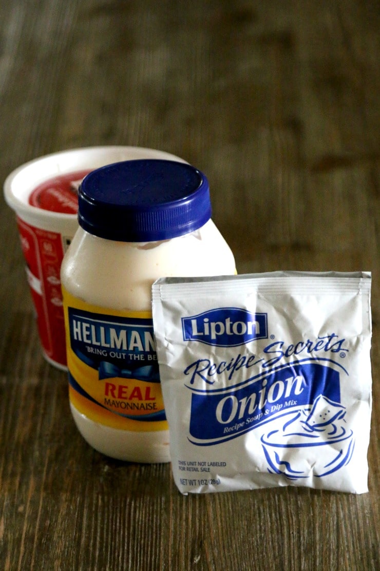 Lipton Onion soup mix, a jar of Hellman's mayonnaise, and a tub of sour cream for onion dip