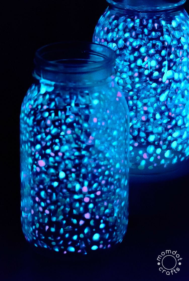Glow-in-the-dark universe jars glowing at night