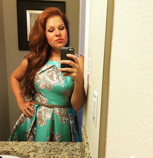 Woman in photo with a beautiful gown and faded Feria intense copper hair color