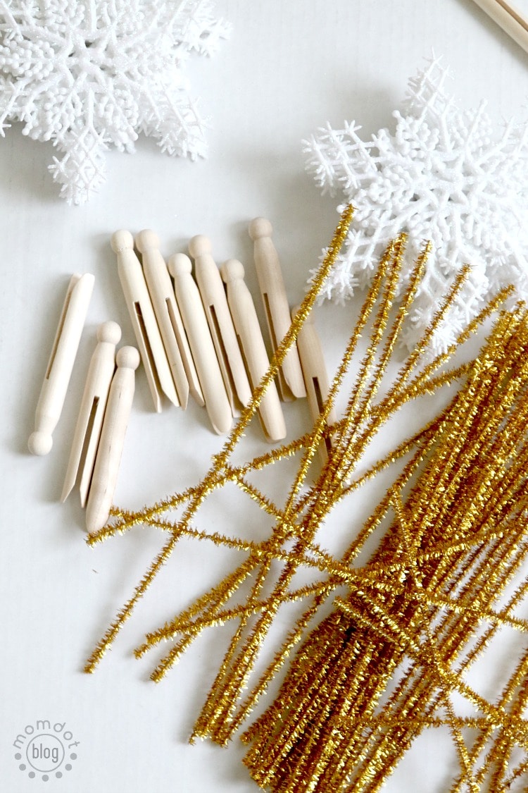 Beautiful Clothespin Angel Ornaments, great for a tree full of angels, to pass out as gifts, and to add on the top of presents for something special. Takes mere minutes to make