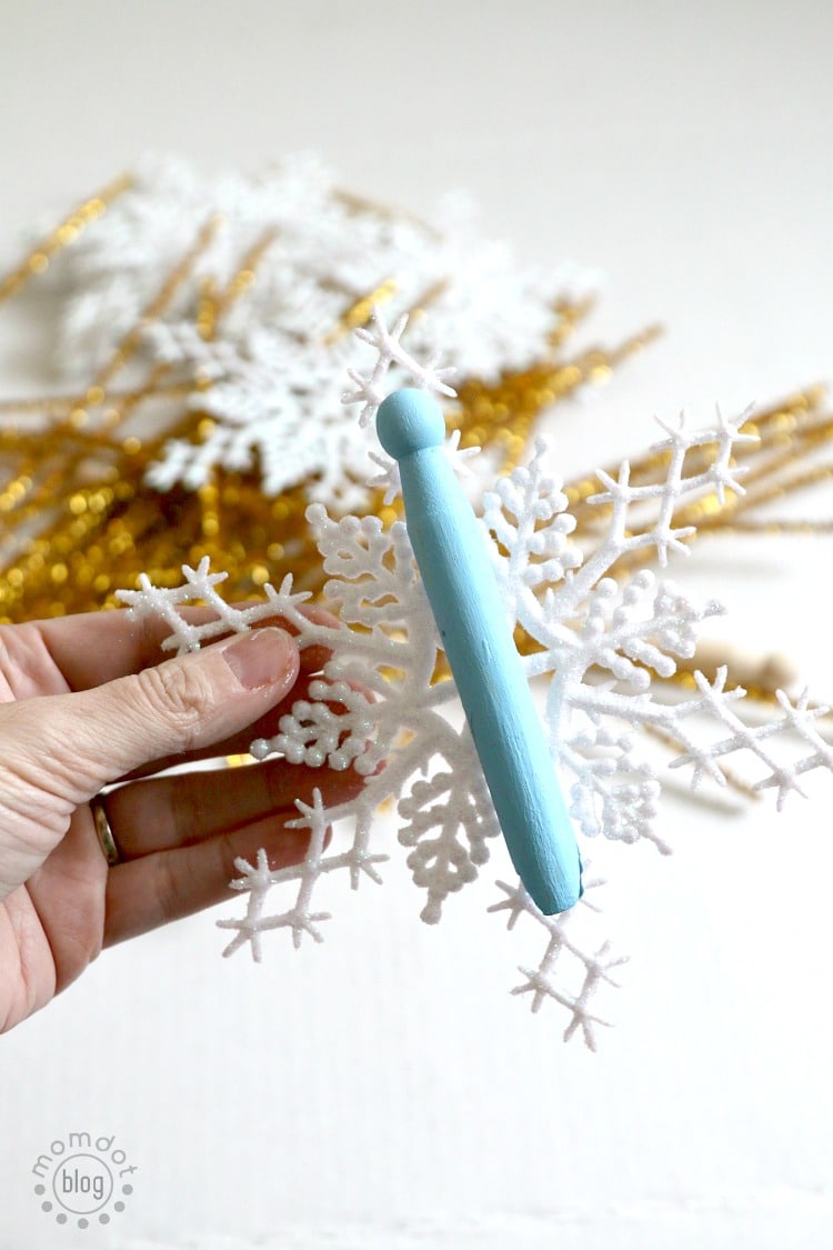 Beautiful Clothespin Angel Ornaments, great for a tree full of angels, to pass out as gifts, and to add on the top of presents for something special. Takes mere minutes to make