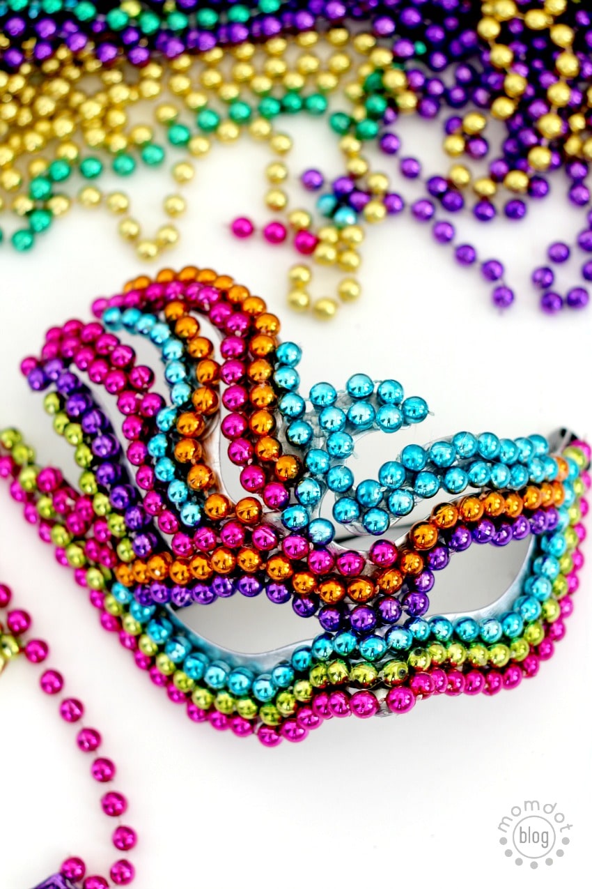 Make your Own Mardi Gras Mask with Leftover Beads - easy, creative and beautiful. DIY Masquerade ball mask