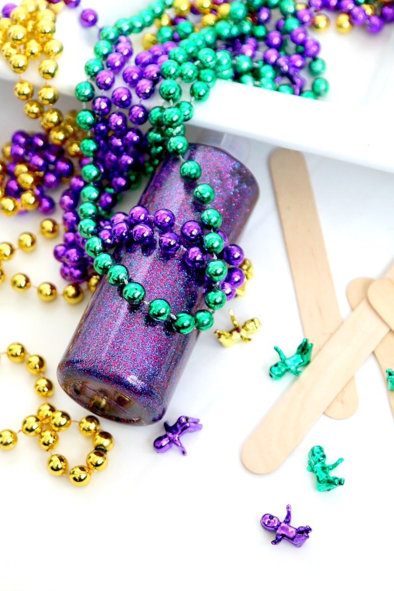 How to make Mardi Gras Slime : whether you celebrate mardi gras or not, get in the spirit of this fun Southern holiday by creating sensory green, gold, and purple slime