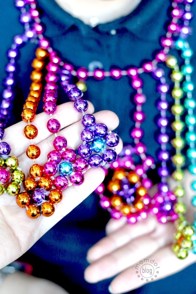 DIY Mardi Gras Flower Necklace: Repurpose your Mardi Gras beads into a statement necklace