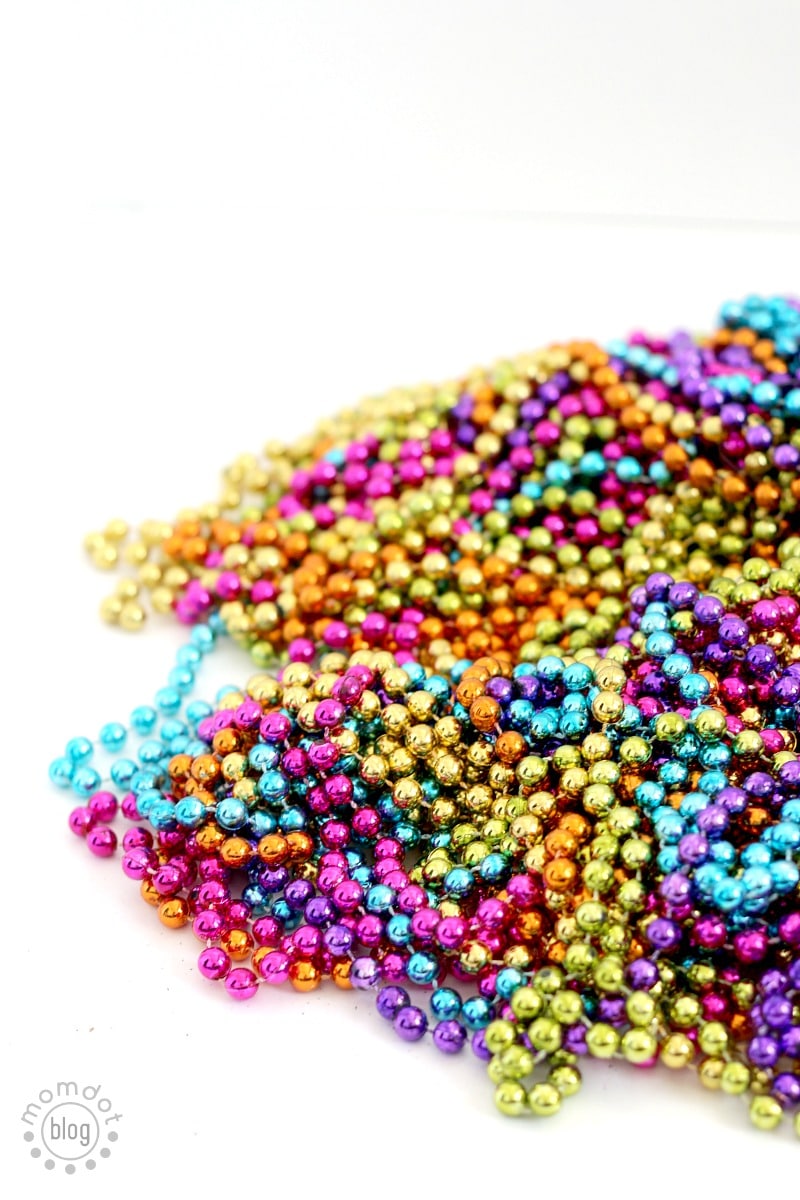 Make your Own Mardi Gras Mask with Leftover Beads - easy, creative and beautiful. DIY Masquerade ball mask