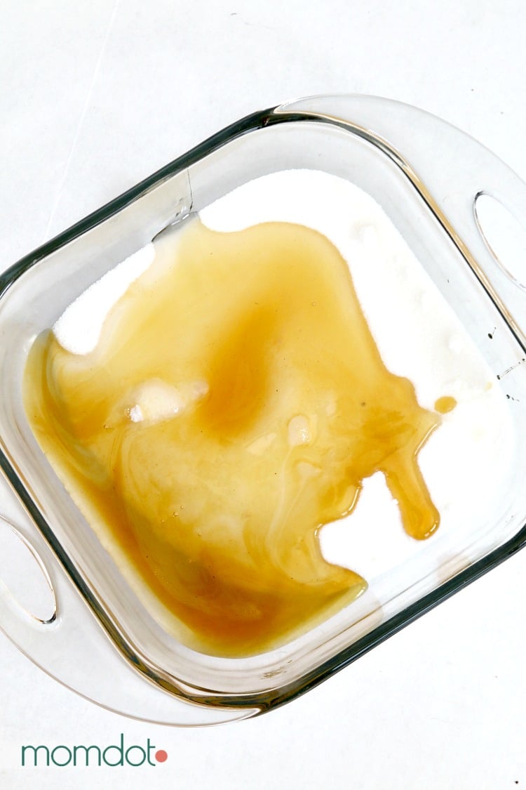 A microwavable dish with honey, sugar, and Karo syrup in it to make honey drops for tea.