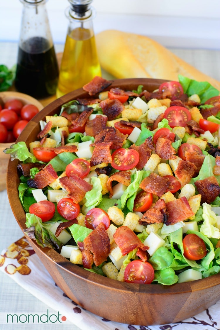 Bruschetta Dinner Salad: A hearty way to get your leafy greens with the right touch of bacon, tomatoes and mozzarella, drizzled with balsamic vinegar 