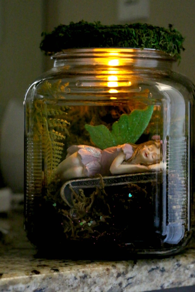 DIY Mason Jar Fairy Garden : adorable Fairy hidden away in a mason jar that can be used as a nightlight, decor, or put in the garden (and safe from rain!) , learn how to adopt a fairy for your garden today 