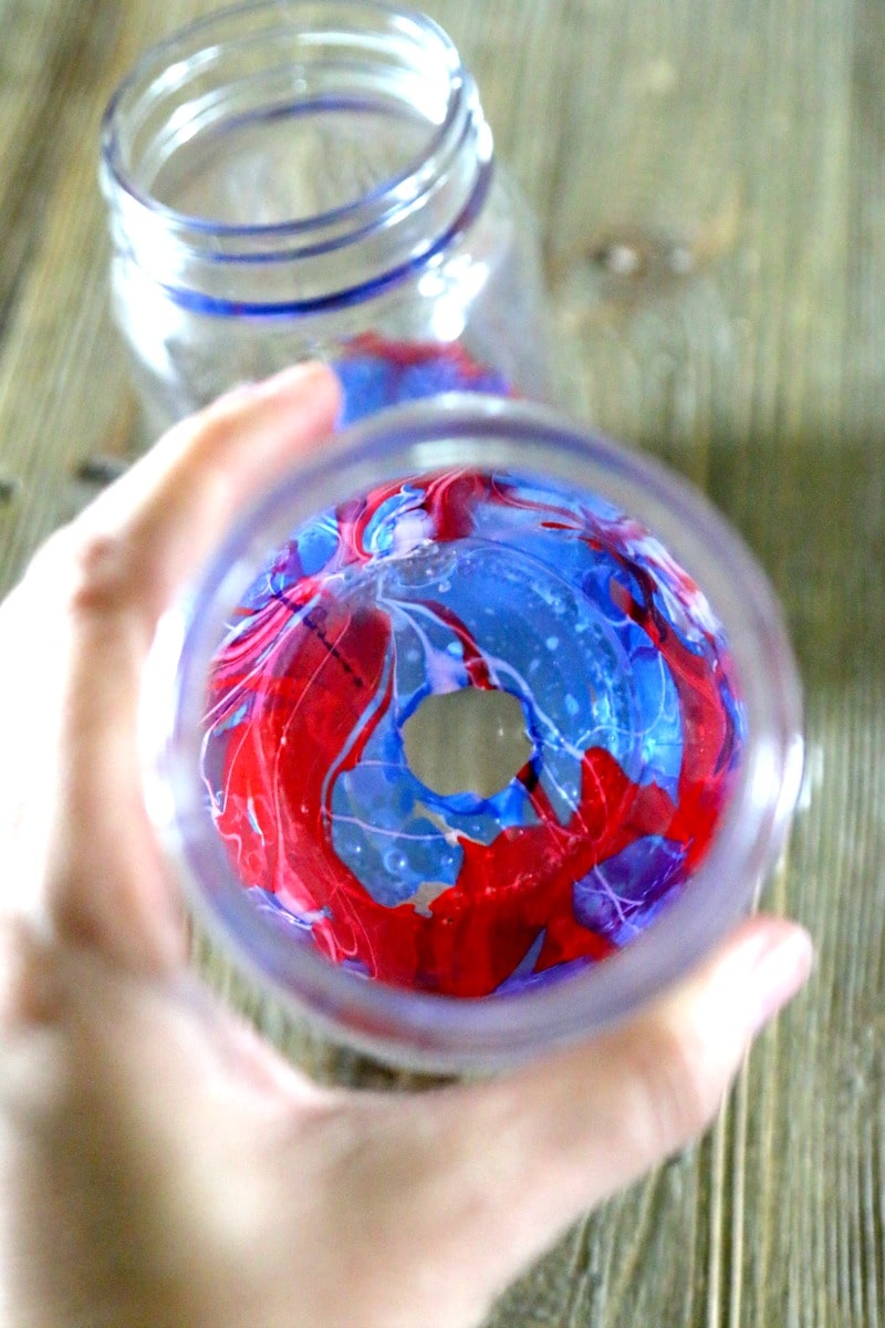 Looking inside a finished marble dip mason jar decoration.