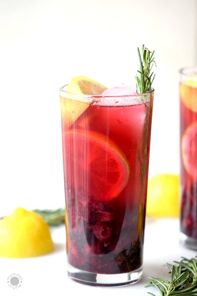 Cranberry & Rosemary Mocktail Jingle Juice, a delicious beverage that is perfectly fall! 