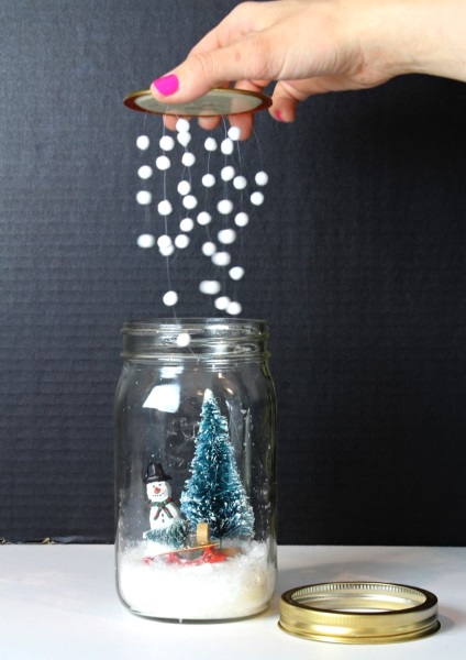 DIY mason Jar Snowglobe with snowy lids