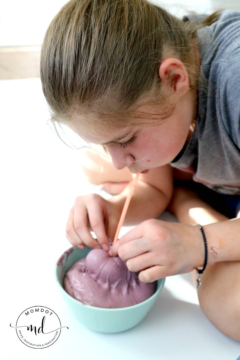 Blowing Bubbles with Slime , two ways to use a bowl and a straw to make huge slime bubbles