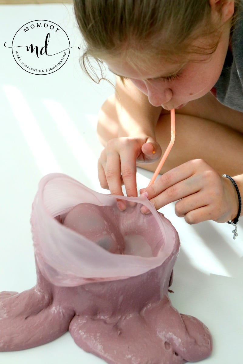 Blowing Bubbles with Slime , two ways to use a bowl and a straw to make huge slime bubbles