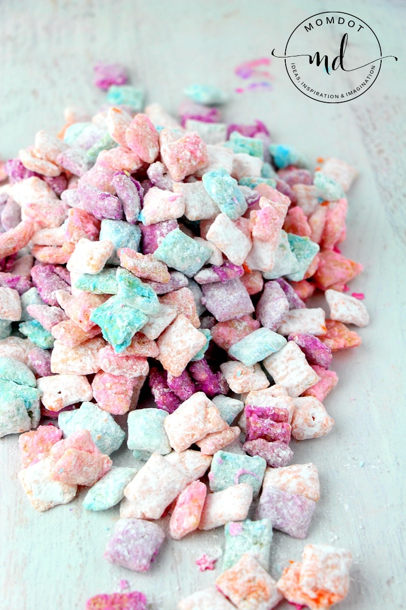 Unicorn Chex Mix in rainbow colors of orange, purple, pink, and blue