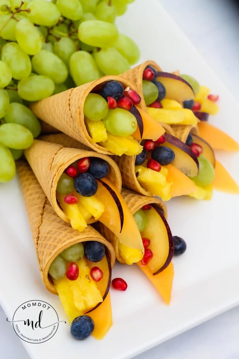 Cornucopia Centerpiece | Fruit Cornucopia with Sugar Cones | Kid Friendly Thanksgiving Idea #tutorial #recipe #thanksgivingrecipes #fruitideas #cornucopia #kidfriendly #crafting #holidays #fall