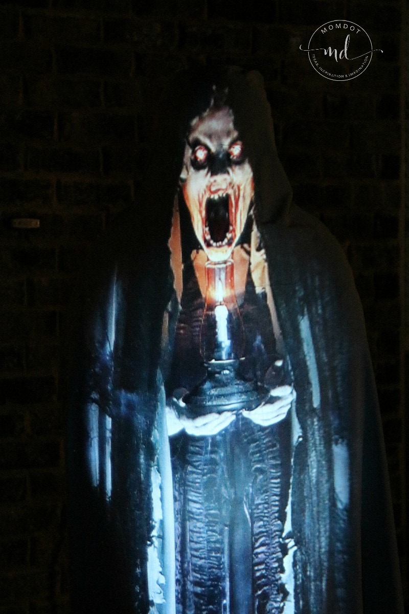 A terrifying bloody witch monster projected onto a 3DFX form