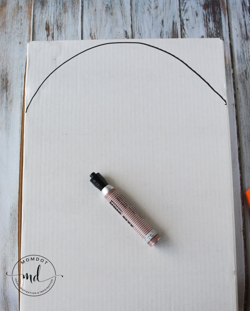Permanent marker and cardboard to make a cardboard tombstone