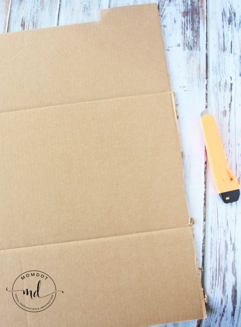 A piece of cardboard and a utility knife