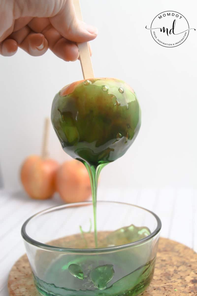 An apple covered in melted Jolly Ranchers to make candy apples