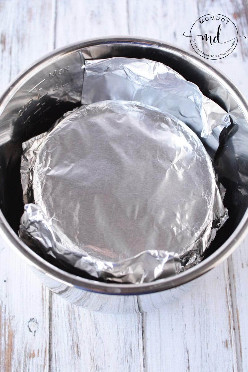 The cheesecake is finished and placed in the Instant Pot for cooking.