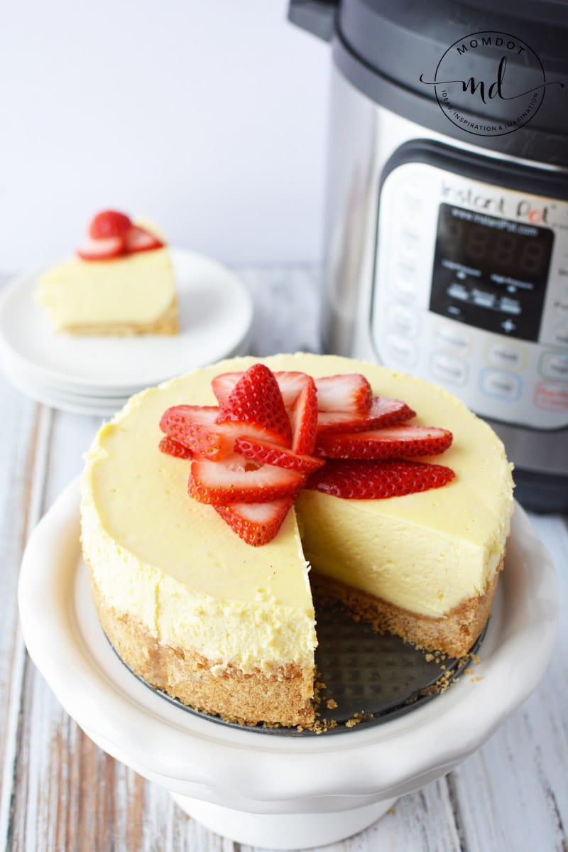 Instant Pot Cheesecake topped with fresh strawberries