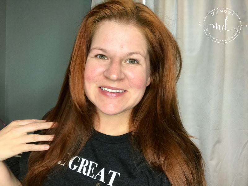 Woman's face looks bright and clear thanks to Olay Regenerist products.