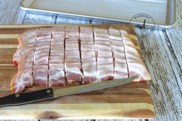 A package of bacon sliced into roughly 2-inch squares so they can be baked into bacon chips.