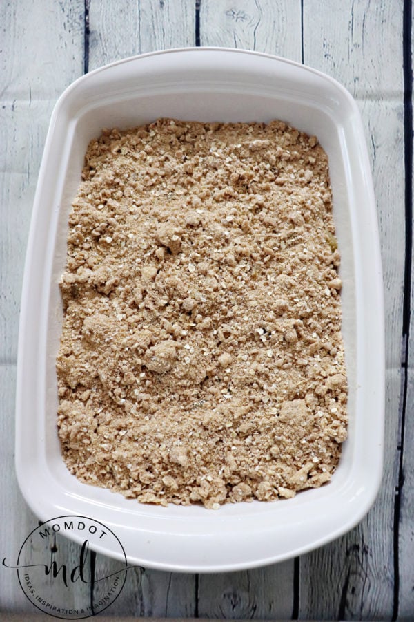 An assembled apple crisp made with pie filling that's ready to pop in the oven.