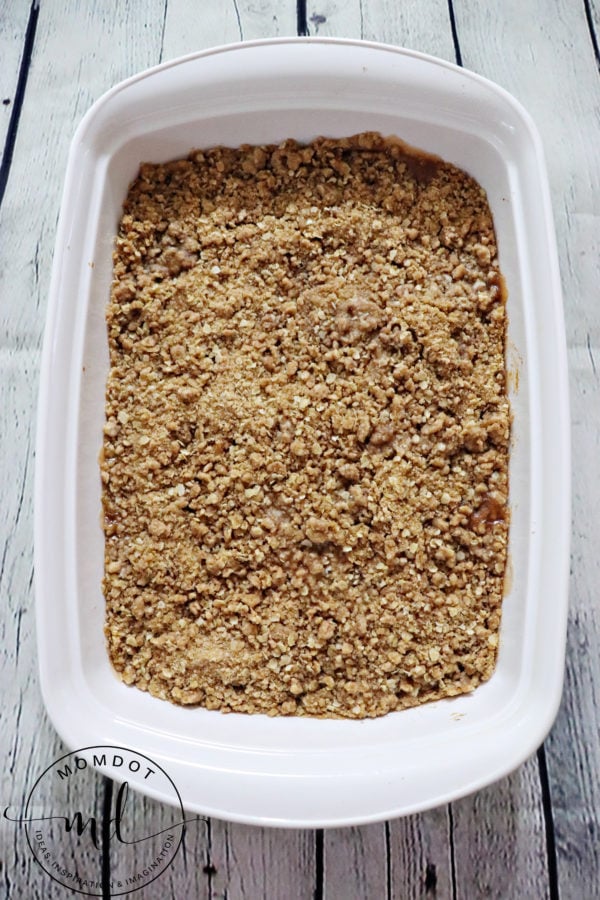 Finished apple pie crisp made with apple pie filling and oats that's been baked to a golden brown on top.
