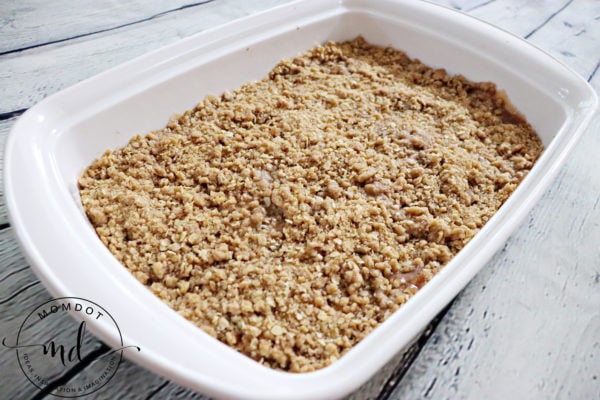 A finished apple crisp made with apple pie filling fresh from the oven. 