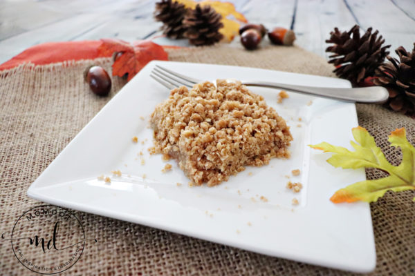 Apple pie crisp made with apple pie filing and oats on a white square plate for an easy fall dessert.