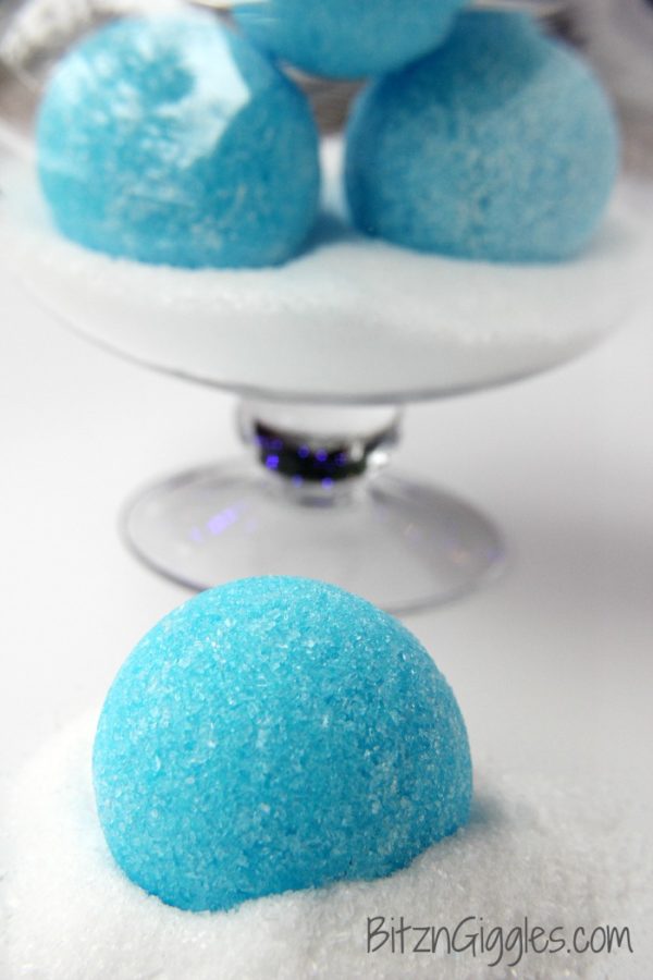 Blue peppermint bath bombs on a decorative plate that are handmade gifts for mom.