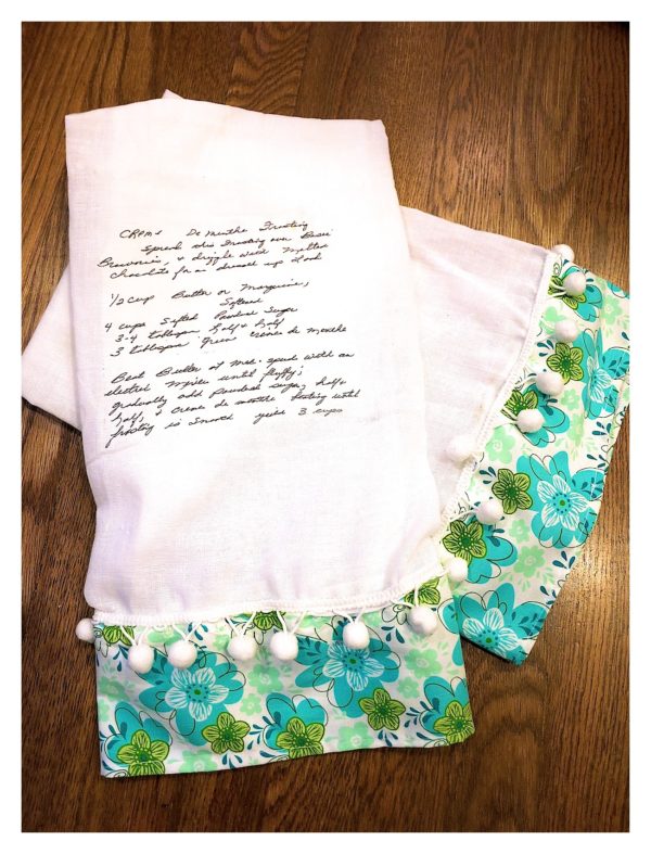 These DIY gift for mom tea towels decorated with some sewn-on premade trim and a favorite family recipe printed on with permanent ink.