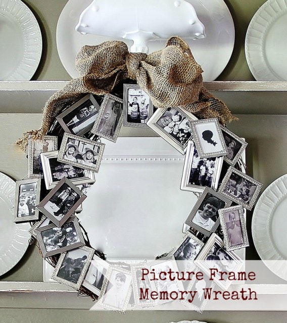 A wreath made from black and white photos in antiqued silver frames fashioned into a wreath shape as a homemade gift for mom.